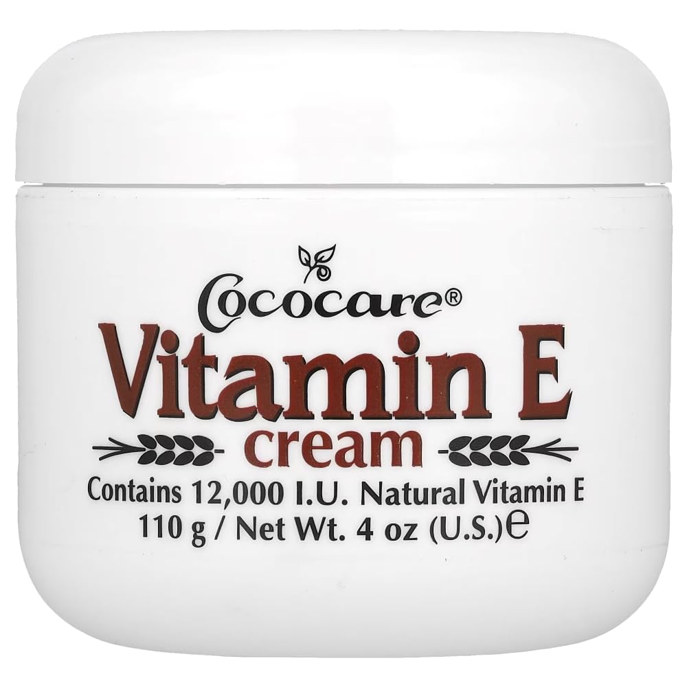 Crème Cococare Vitamine E 12000 Unités Internationales dans un pot, hydratation durable pour peau sèche.