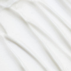 Cocokind Sake Body Lotion being applied for quick absorption and smooth skin.