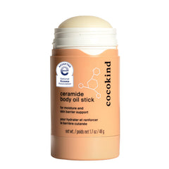 Cocokind Stick Huile-Corps aux Céramides sur peau propre, hydratation légère