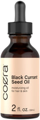 Coera huile de graine groseille noire en flacon, idéale pour hydrater cheveux et peau.