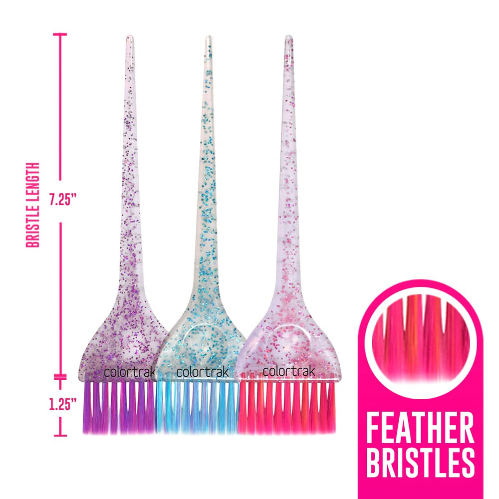 La brosse Colortrak couleur tri-poignees etincelantes violet royal offre une prise en main confortable.