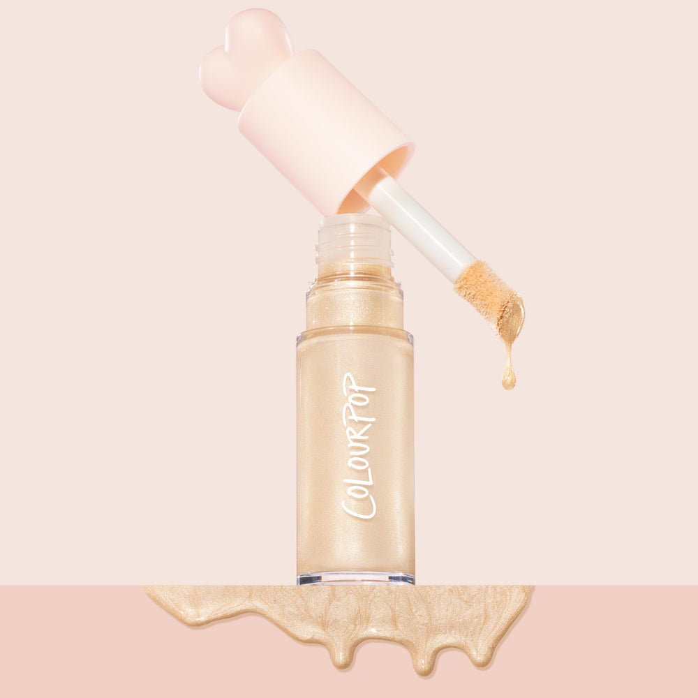 Applying Colour Pop Hi-Lite with finger for seamless blend on the face