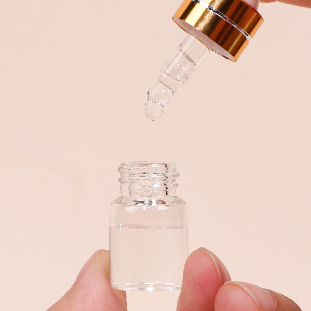 Bouteilles Comrzor compactes 2ml, parfaites pour échantillons et voyages.