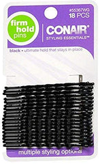 Pins Scunci noirs en action sur un chignon pour tenue discrète.