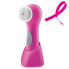 Conair True Glow brosse faciale sonique, accessoires et chargeur inclus, rangement pratique.