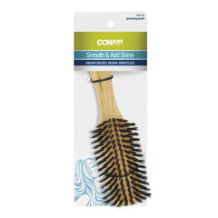 Brosse Conair Wood Flair avec base en bois anti-statique pour réduire les frisottis et ajouter du volume.