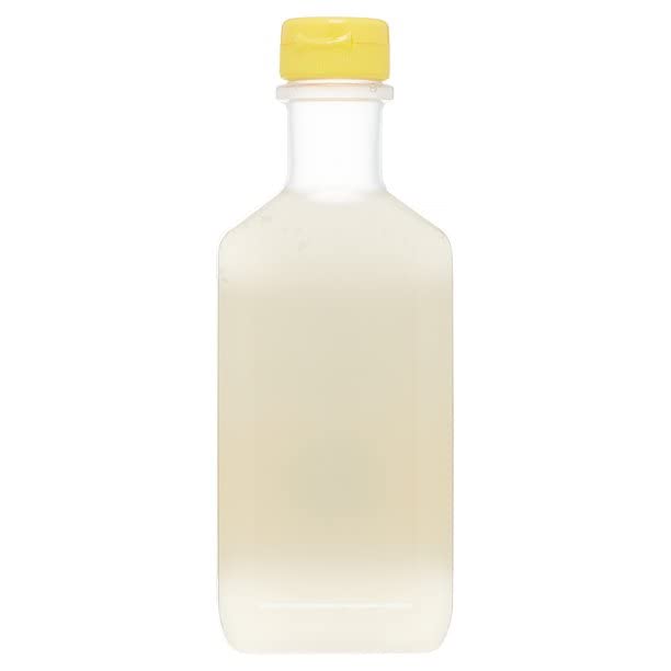 Corn Huskers Lotion mains sans huile, pompe – application pratique et absorption rapide.