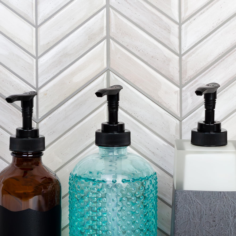 Tige longue de 8 pouces idéale pour bouteilles volumineuses.