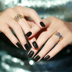 Vernis COSMOO noir glitter – brillance éclatante dès l’application sur les ongles.