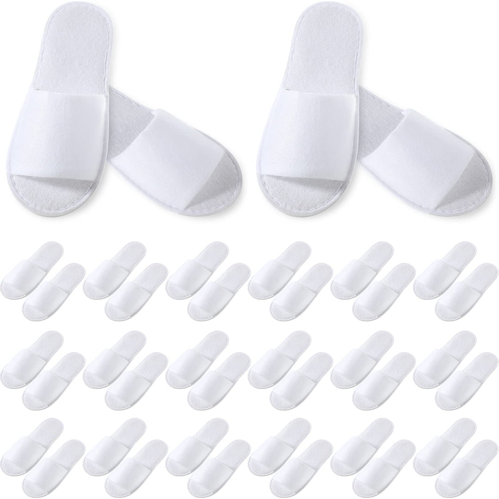 Chaussons jetables Coume à bout ouvert, blanc et confortables.