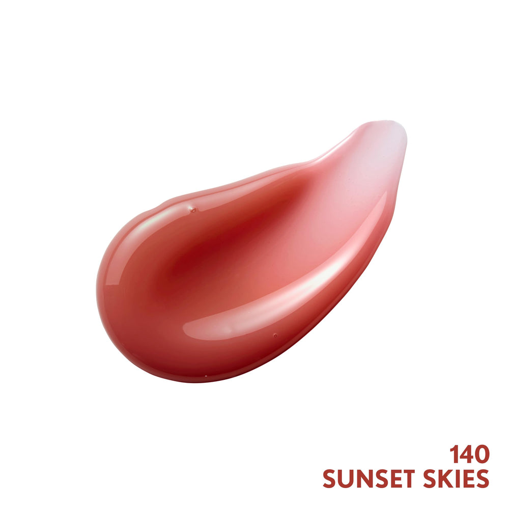 Échantillon Sunset Skies de COVERGIRL Yummy Gloss, swatch translucide et brillant.