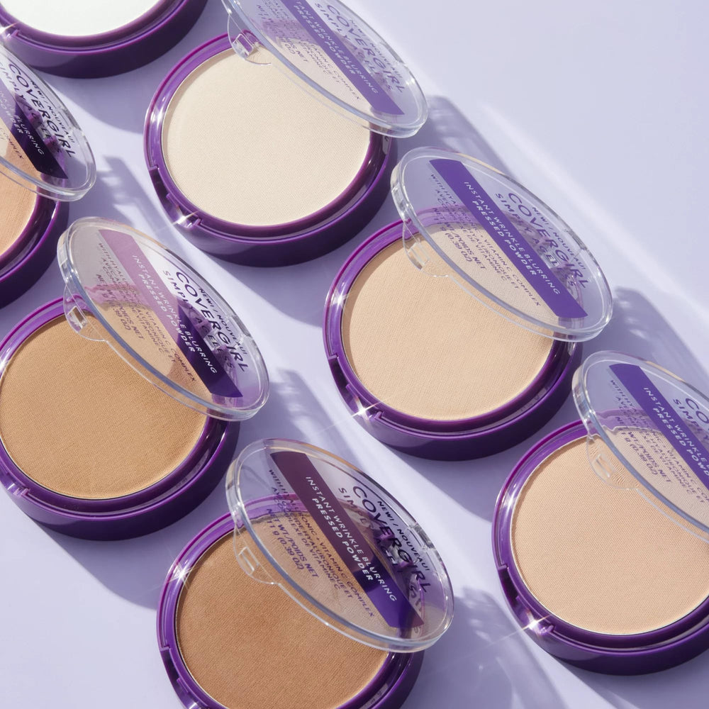Covergirl Simply Ageless compact in purse for quick makeup refresh.