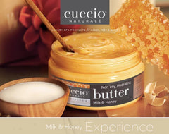 Hands applying Cuccio lotion for quick absorption and soft skin