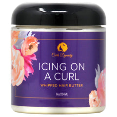 Curls Dynasty Icing On A Curl, application sur cheveux, douceur et contrôle des frisottis.