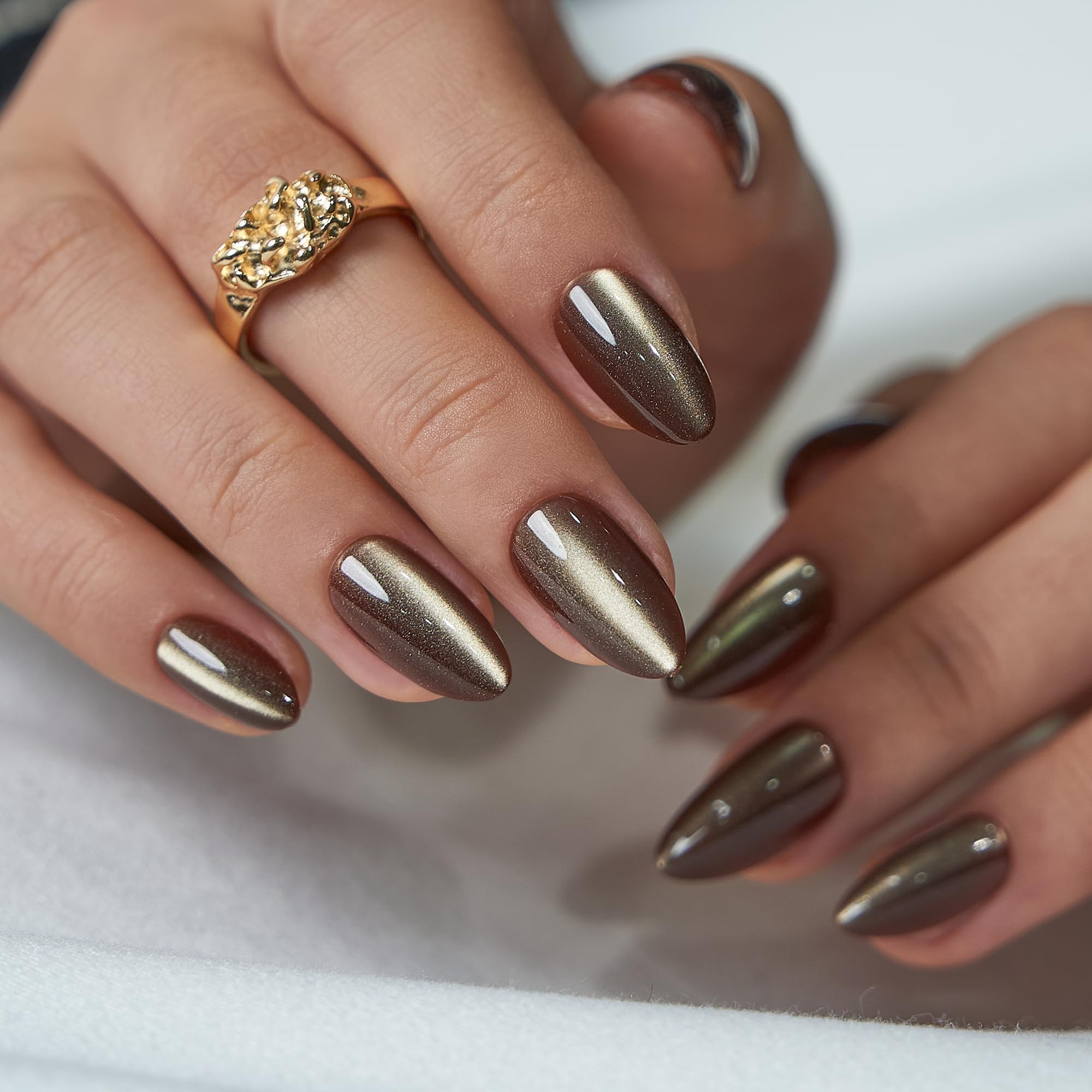 CurvLife medium almond nails on hand illustrate natural cuticle alignment.
