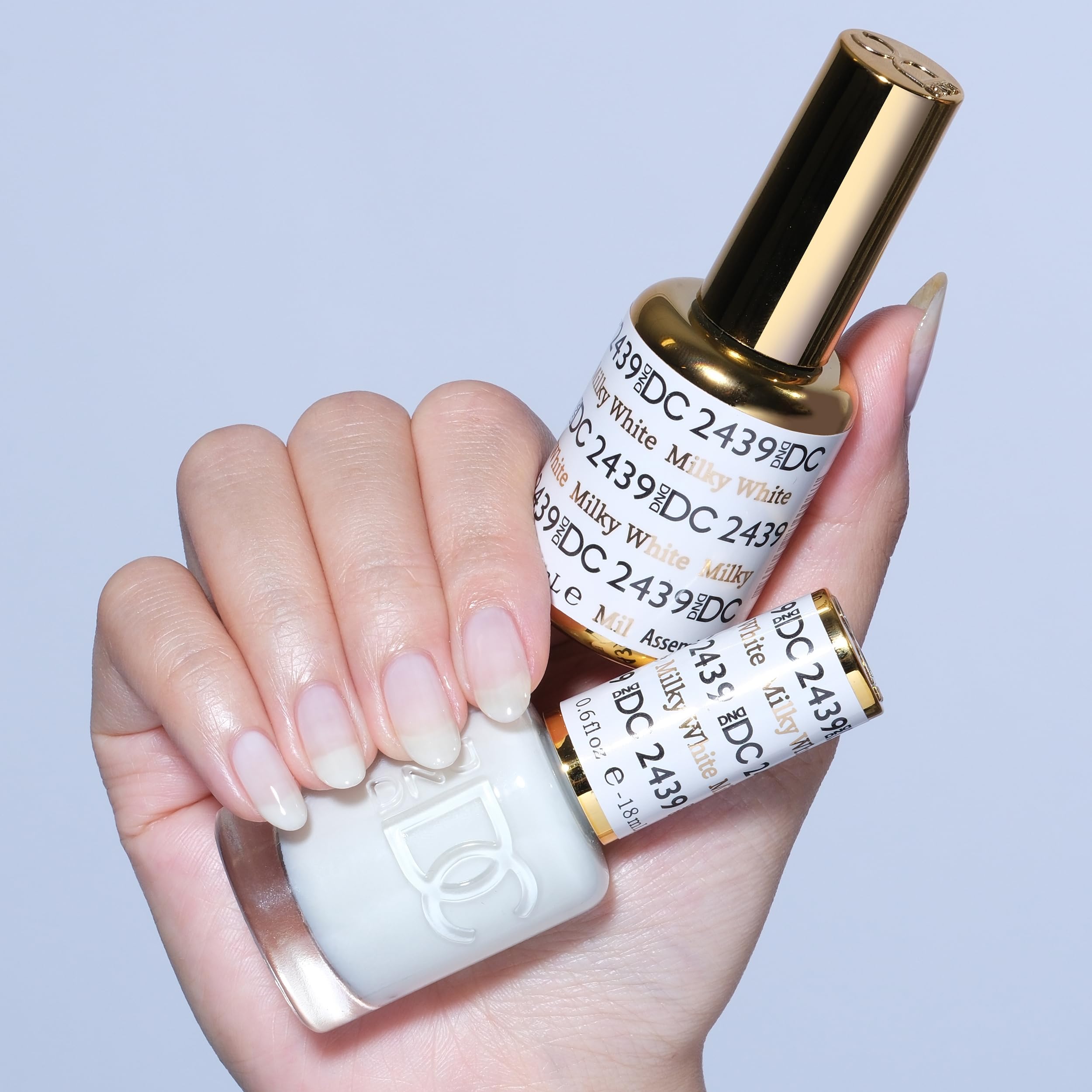 DAISY DND DC gel polish Milky White 2439 swatch shows sheer, blendable coverage.