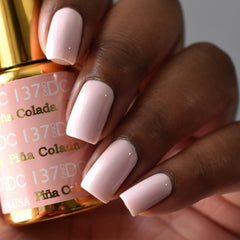 Daisy DND Pina Colada lacquer bottle with glossy finish to match gel.
