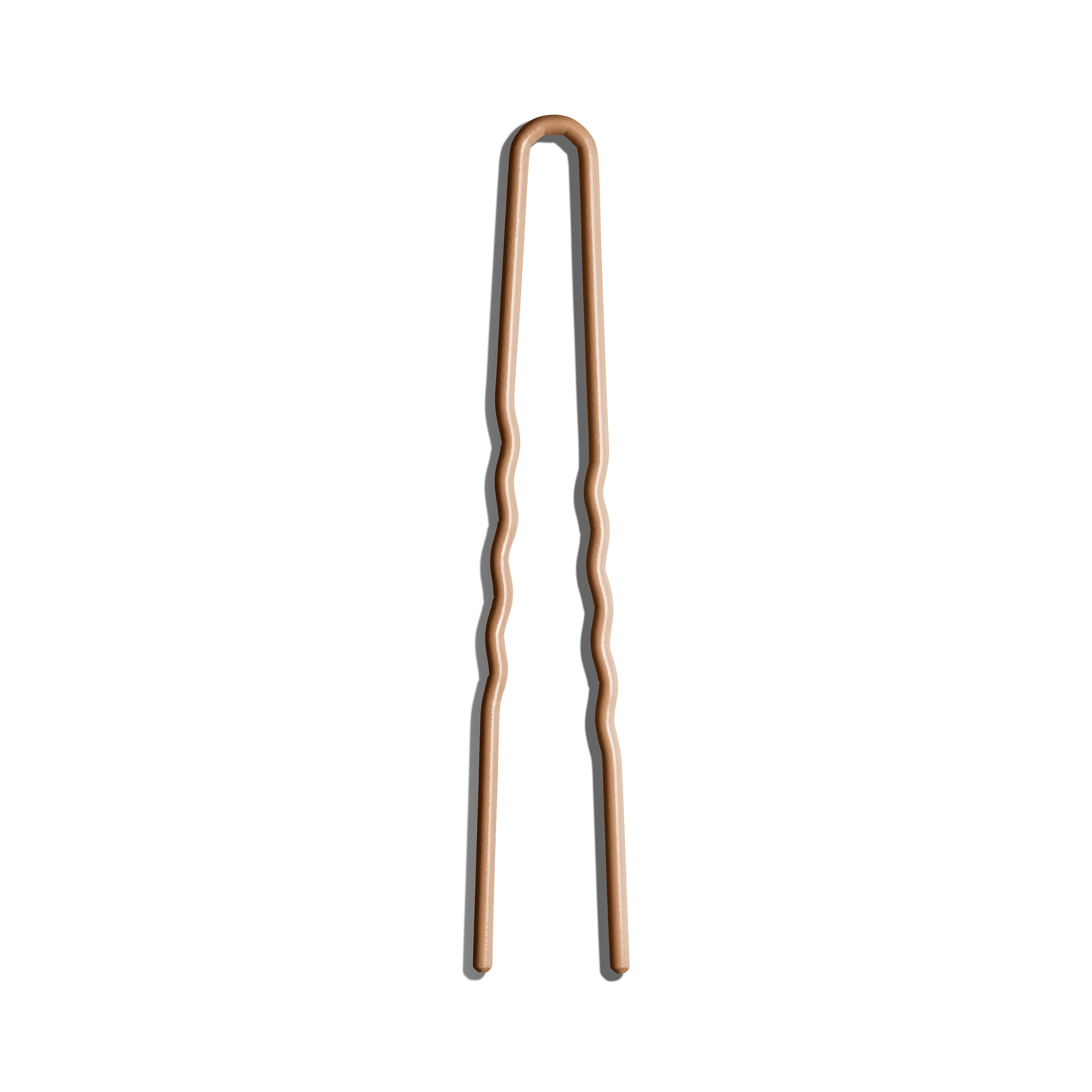 Pin Day Rate Beauty anti-accrochages facilite le coiffage sans tiraillement.