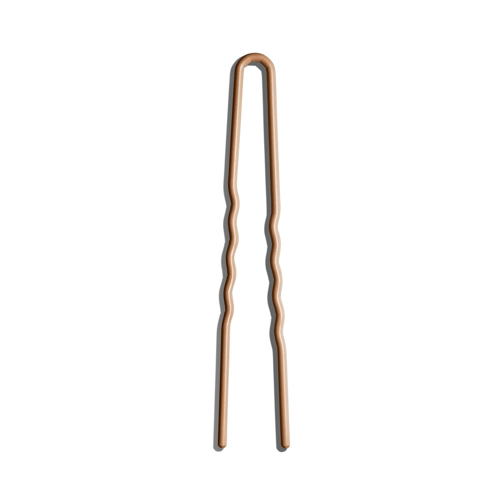 Pin Day Rate Beauty anti-accrochages facilite le coiffage sans tiraillement.