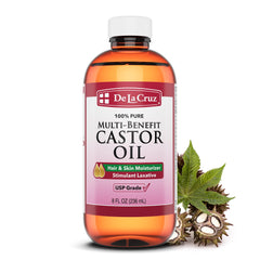 Huile de ricin De La Cruz dans sa bouteille, hydratation durable pour peau et cheveux.