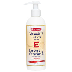 La lotion De La Cruz Vitamine E, bouteille, hydrate profondément les zones sèches.