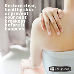 De La Cruz sulfur ointment texture on finger, showing deep pore access for targeted treatment.