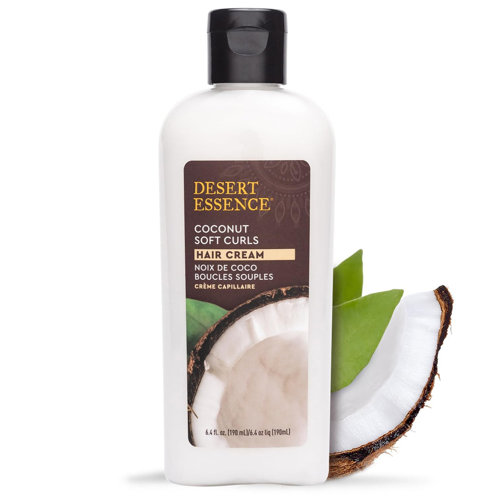 Desert Essence Coconut Soft Curls, crème en bouteille pour des boucles définies et brillantes.