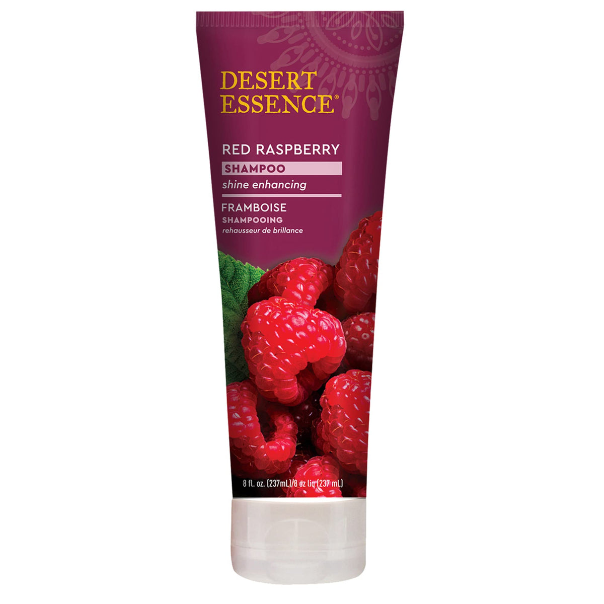 Shampoing Desert Essence Framboise Rouge en bouteille, brillance durable.