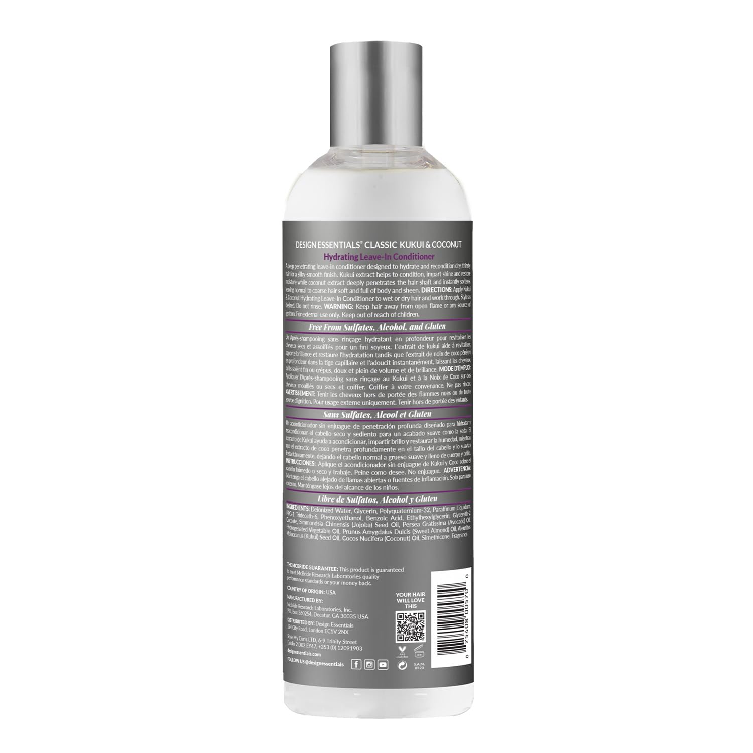 Mains appliquant Design Essentials Kukui & Coconut pour cheveux faciles à démêler.