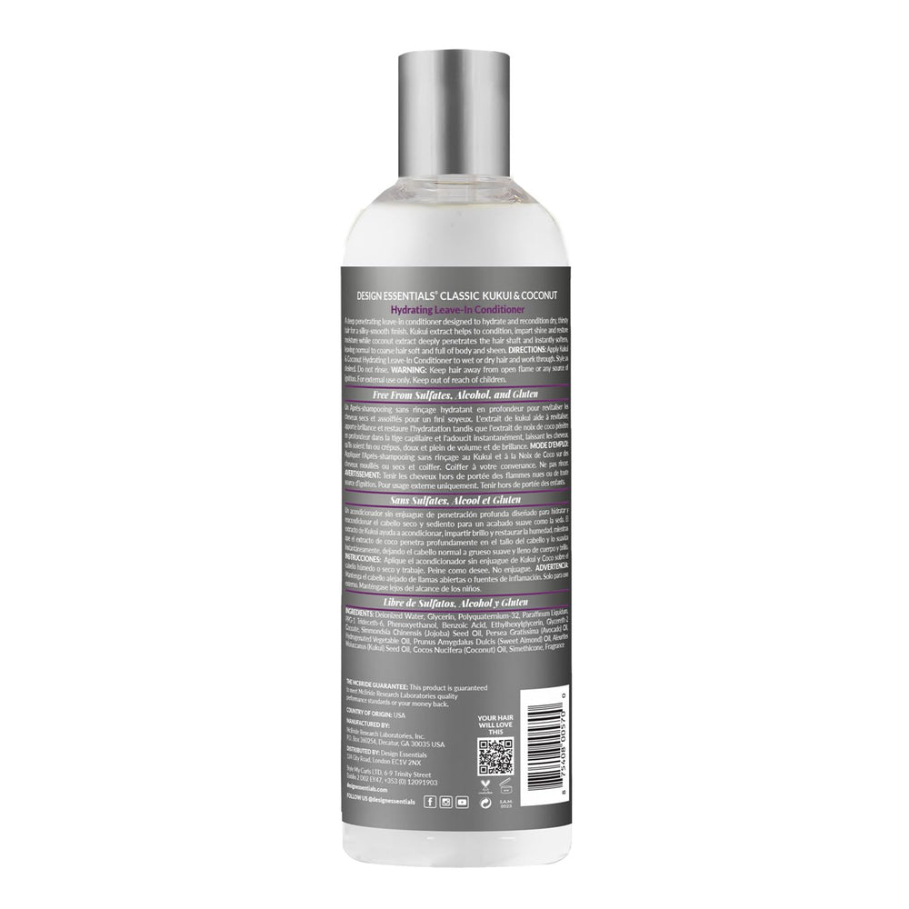 Mains appliquant Design Essentials Kukui & Coconut pour cheveux faciles à démêler.