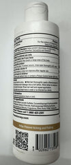 Shampoing DHS Zinc appliqué sur le cuir chevelu pour réduire les irritations.