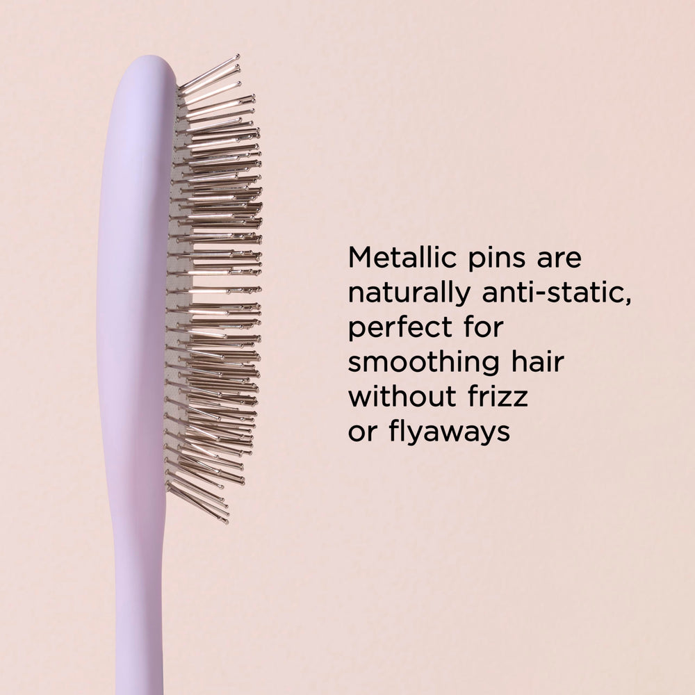 Brosse Diane massage cuir chevelu pour une sensation relaxante pendant le brushing.