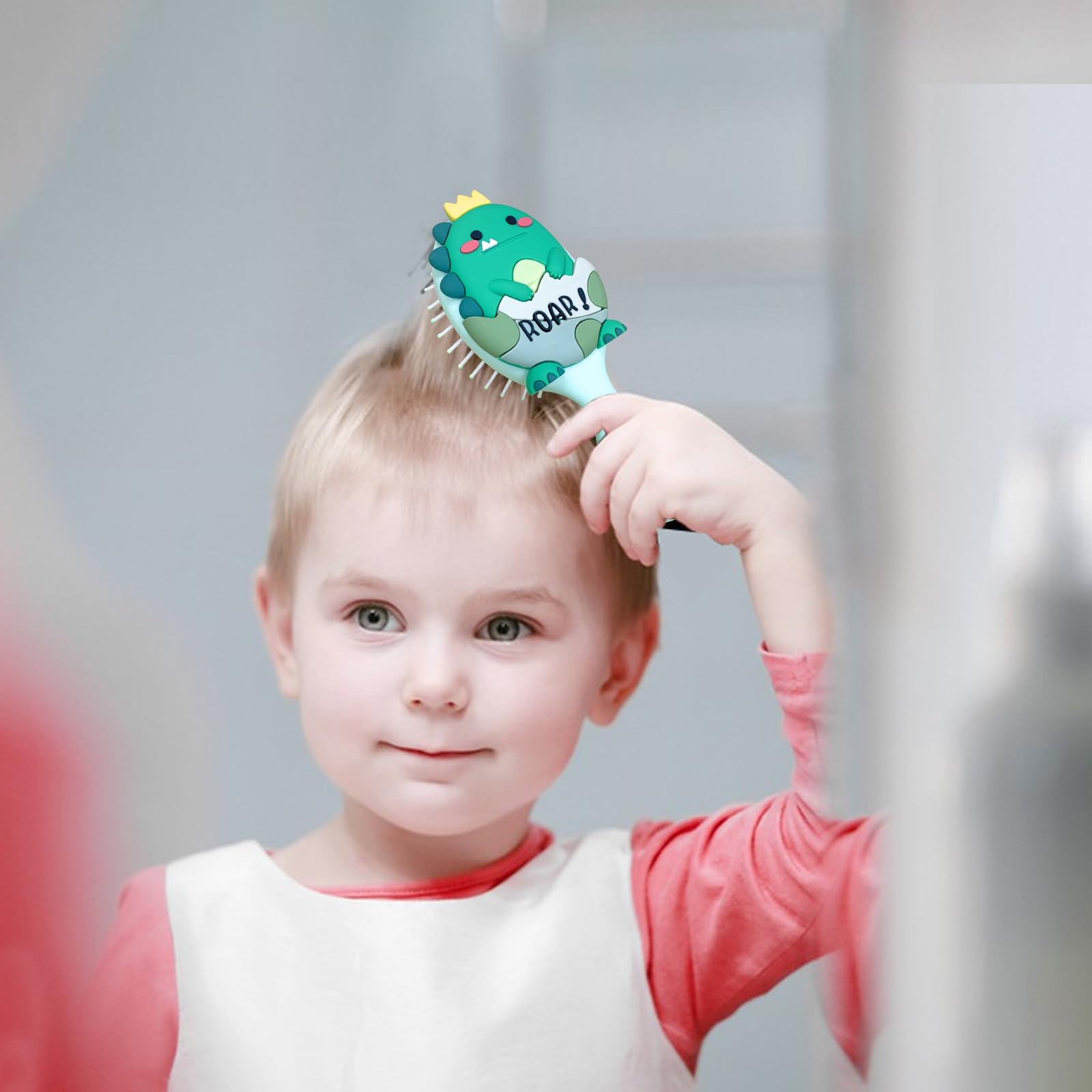 Dinatis brosse mini-dino convient aux cheveux fins pour démêlage sans douleur.