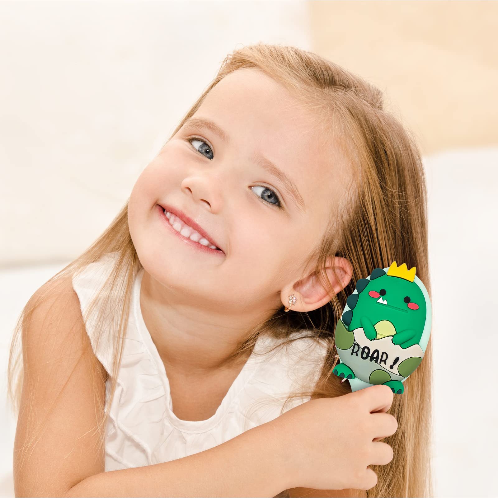 Dinatis brosse enfant avec coussin d’air pour un coiffage en douceur et plaisir.