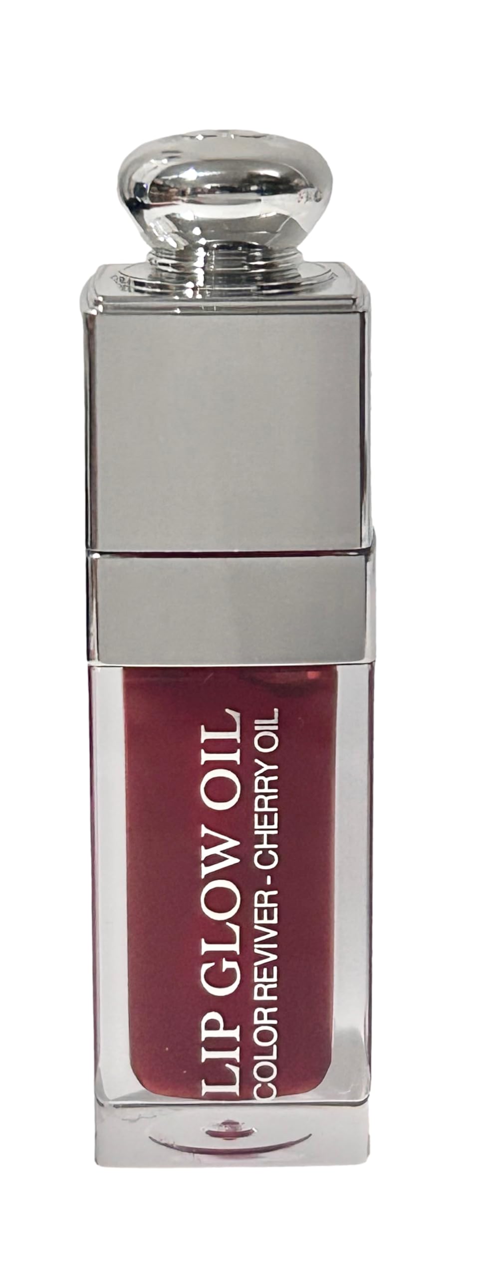Dior Lip Glow Oil flacon transparent cerise pour un look naturel.
