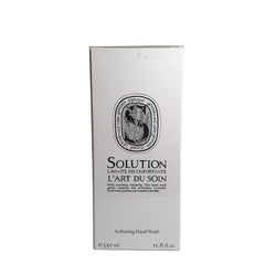 Diptyque Savon liquide adoucissant pour les mains — goutte révélant son parfum frais et réconfortant.