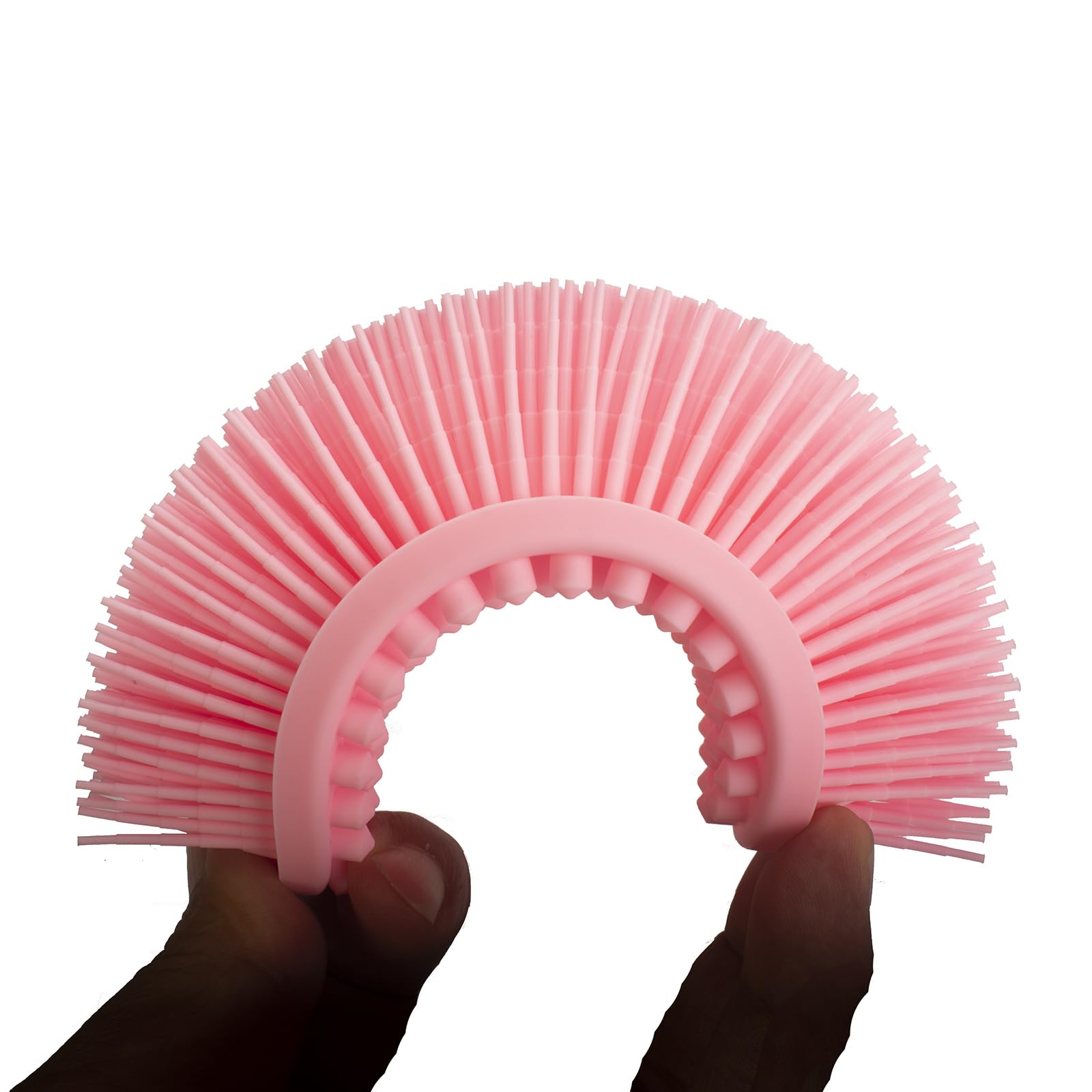 Brosse DNC à brins doux en silicone, idéale pour peau sensible.