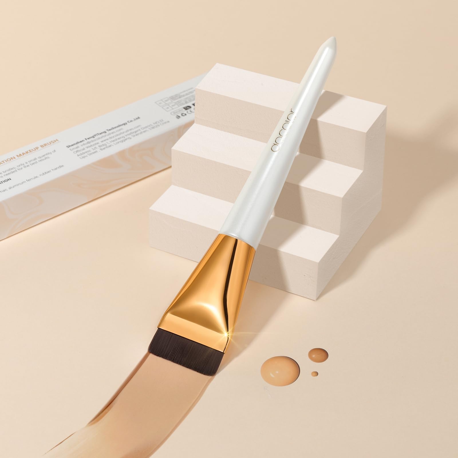 Brosse docolor appli crème soin visage.