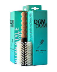 Brosse Dom Dom ronde avec poils sanglier et nylon, démêle et lisse les longueurs.