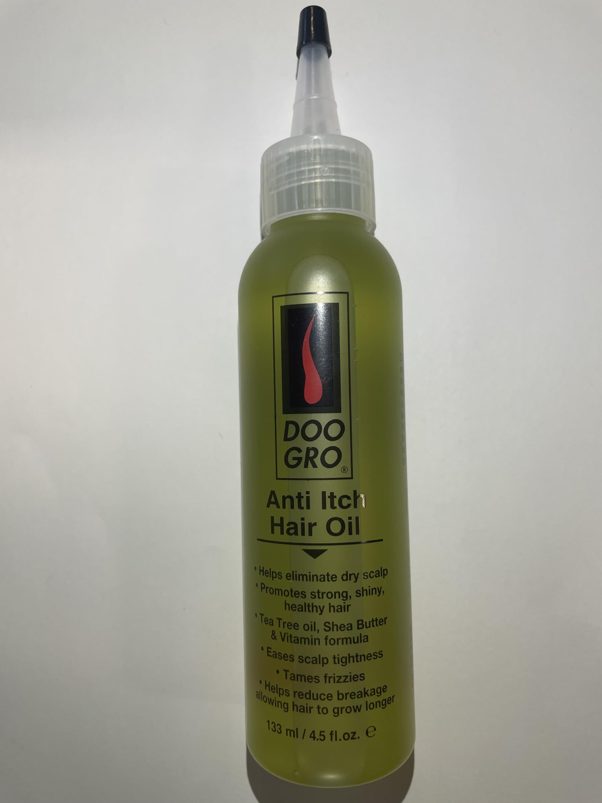 DOO GRO huile de croissance — texture légère qui pénètre rapidement sans laisser gras.