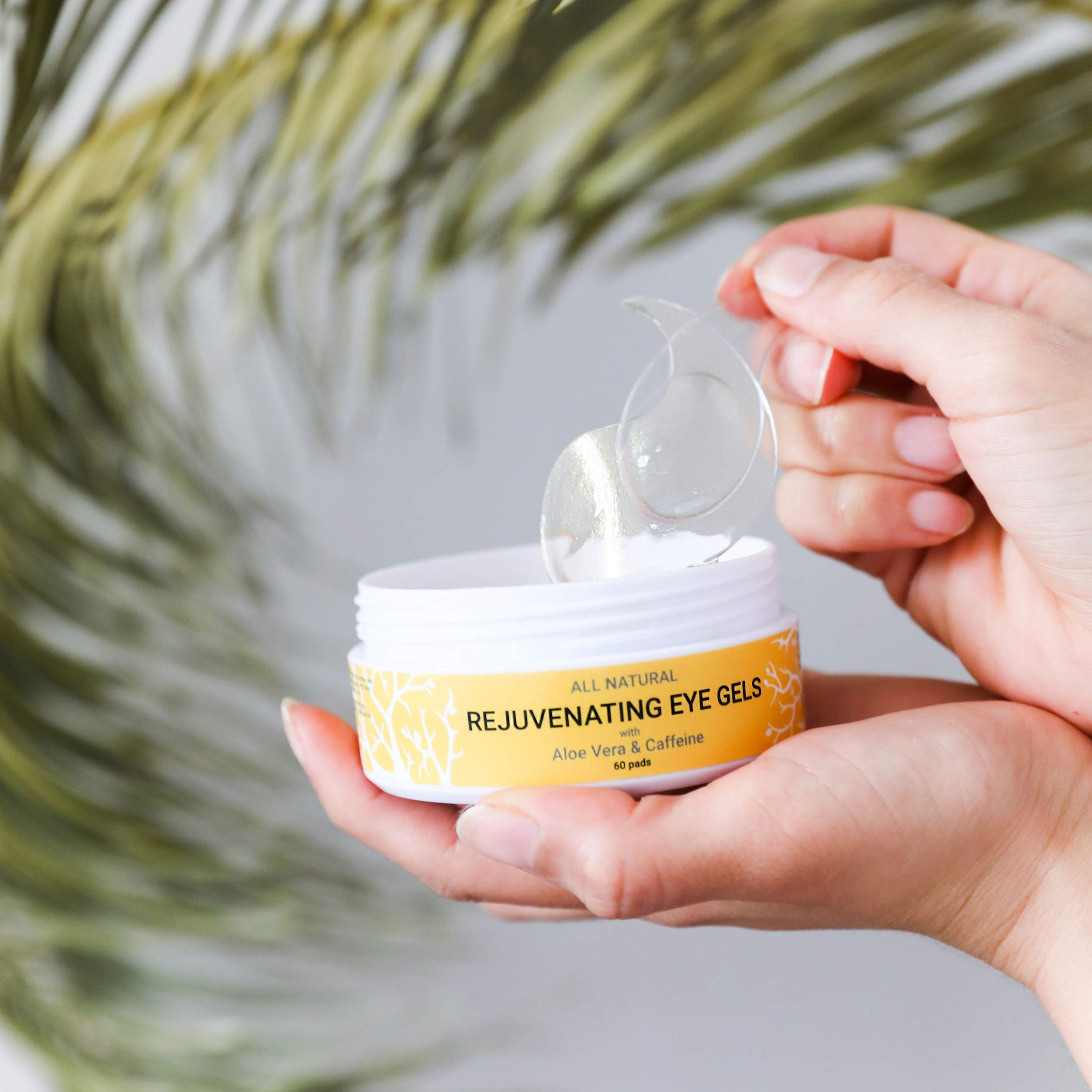 Masque yeux transparent avec or 24K, hydratation douce et luxe discret.