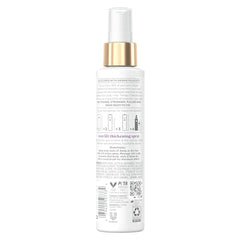 Spray Density Boost Root Lift appliqué pour créer du volume visible.