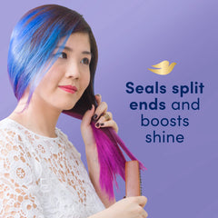 Dove Hair Therapy application du sérum avant coiffage pour une répartition uniforme.