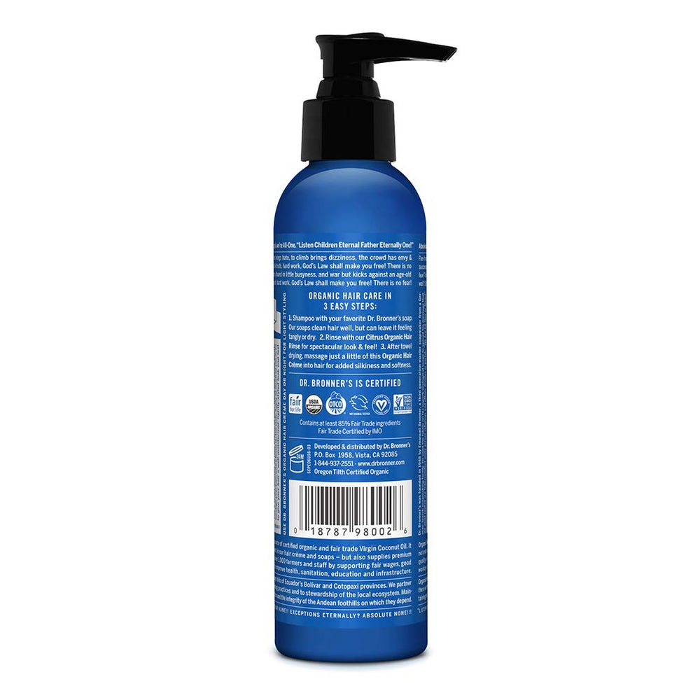Dr. Bronner’s Crème Cheveux appliquée sur cheveux humides pour définir les boucles.