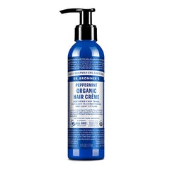 Dr. Bronner’s Crème Cheveux versement facile sur la bouteille pour démarrer la routine.