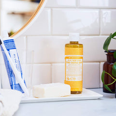 Dr. Bronner's savon liquide rose – parfum floral et soin peau délicat.