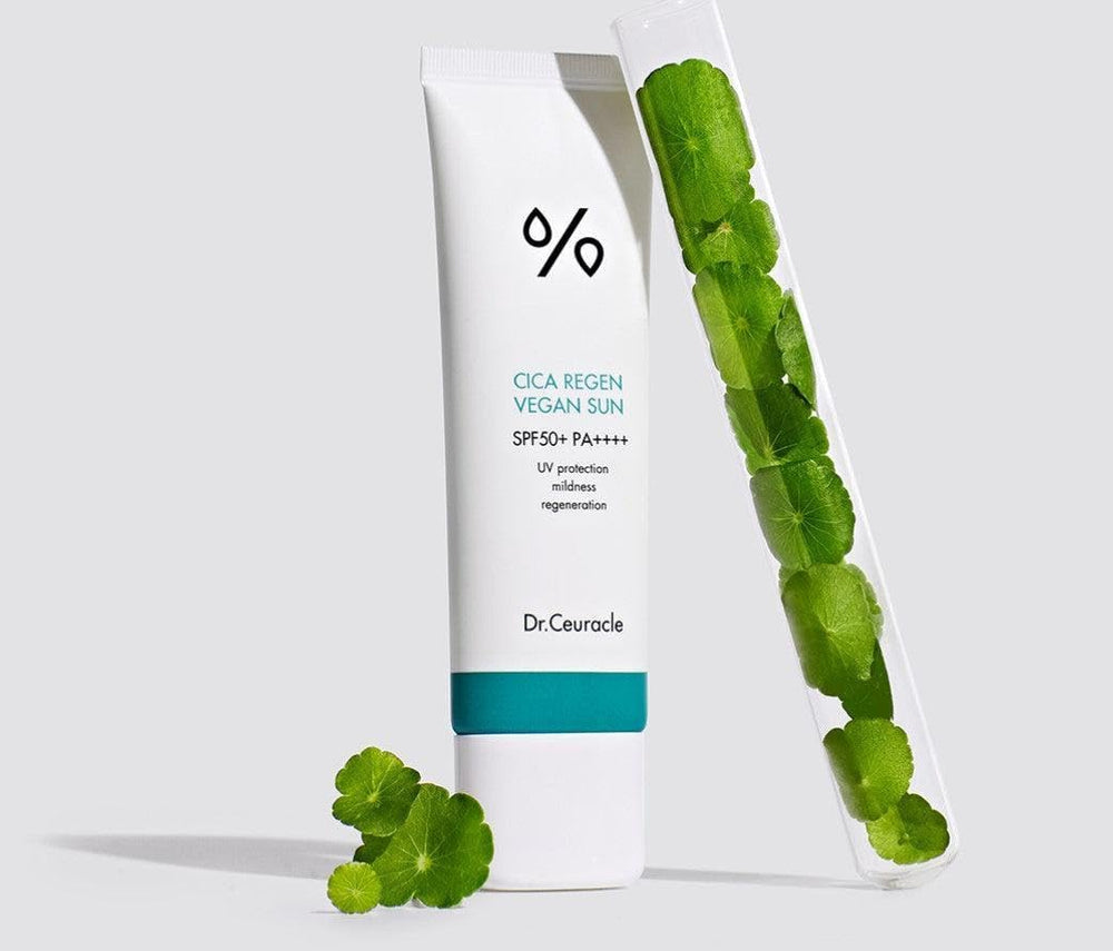 Gently applying Dr Ceuracle sunscreen on the face for daily protection