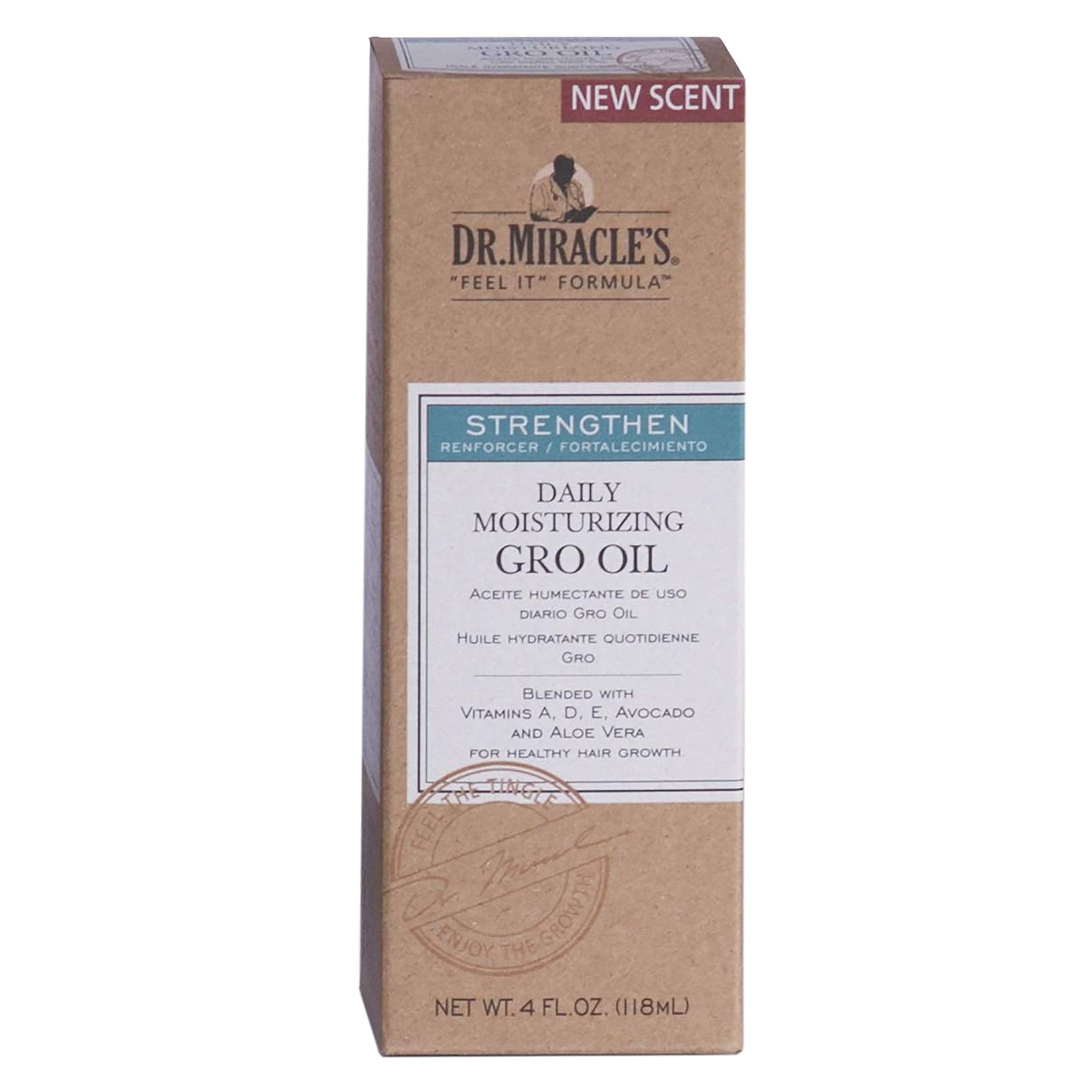 Application de Dr. Miracle's Gro Oil sur cheveux pour hydrater et lisser.