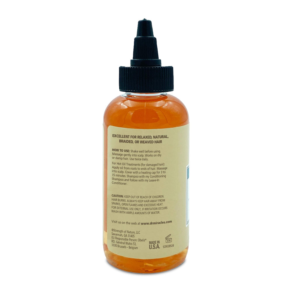 Ambiance soin quotidien avec Dr. Miracle's Gro Oil pour cheveux hydratés et démêlés.