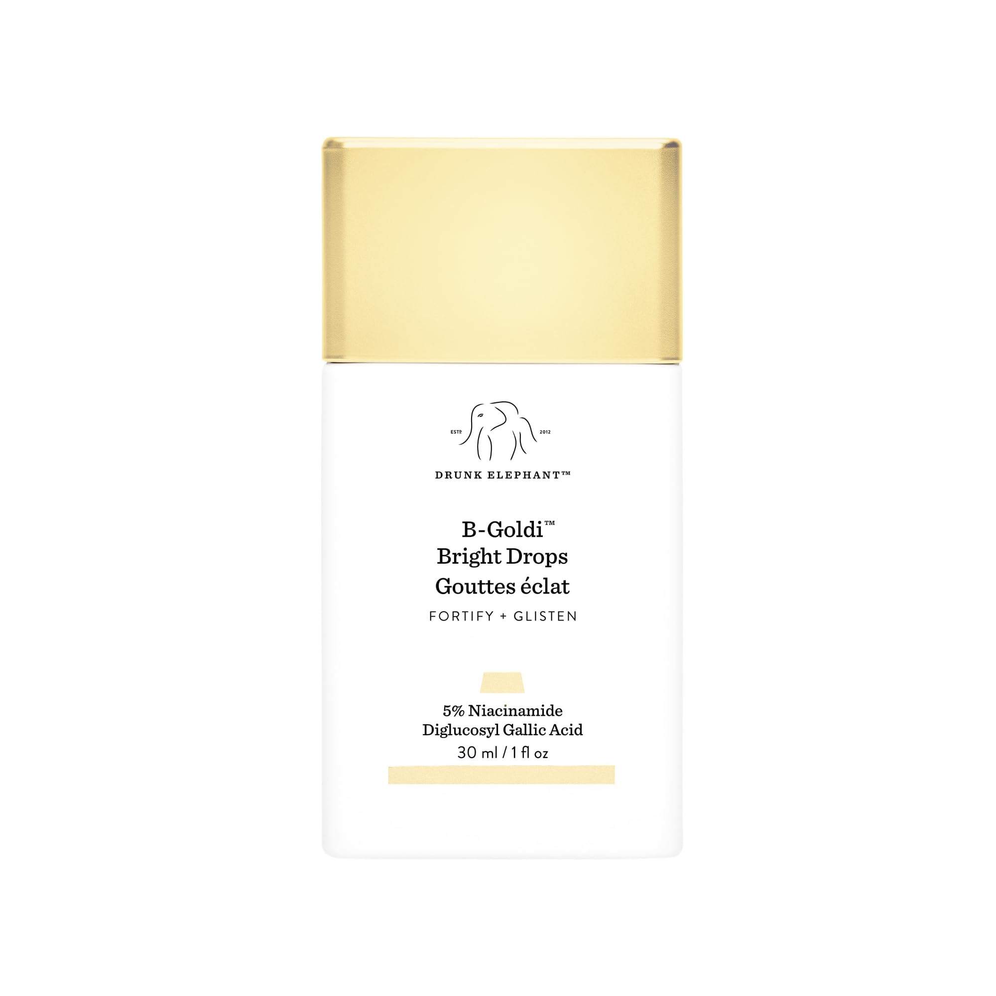 Drunk Elephant B-Goldi Bright Drops sur la bouteille, éclat doré subtil et uniforme.